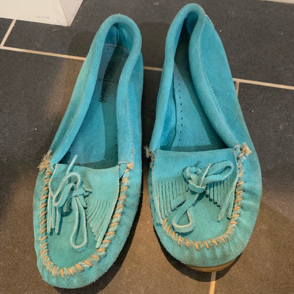 Blue Minnetonka moccasins.